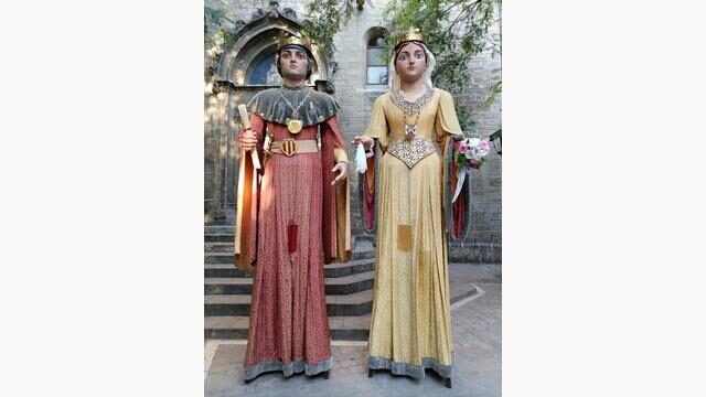 Postal dels gegants amb els vestits antics